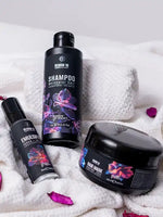 Зареди изображението в галерията, Bloom 16 Възстановяваща грижа за коса - шампоан, емулсия и маска за коса на бяла кърпа.
