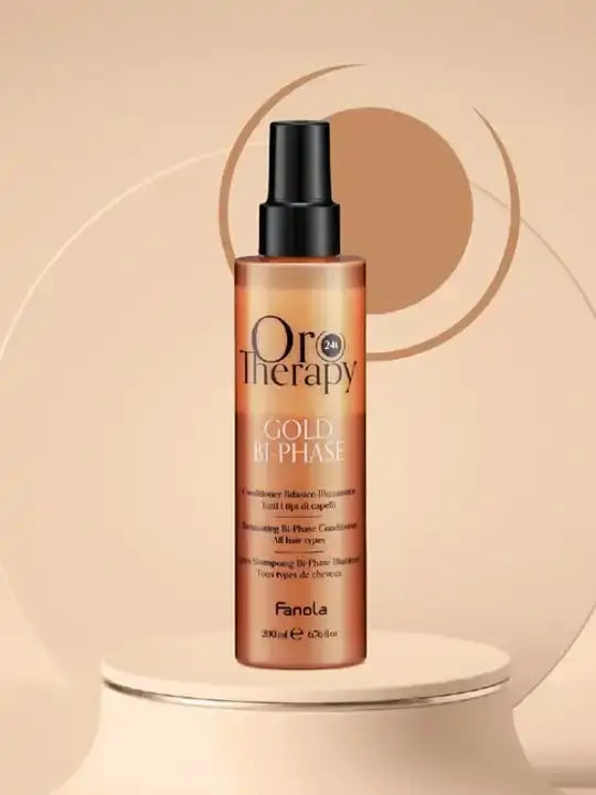Oro Therapy Gold bi-phase spray balm 200ml for deep hydration and shine, enriching hair with moisture and protection.