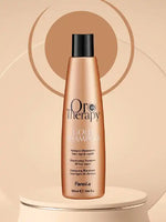 Зареди изображението в галерията, Oro Therapy Gold хидратиращ шампоан 300 мл, осигуряващ мекота и блясък за всички типове коса.
